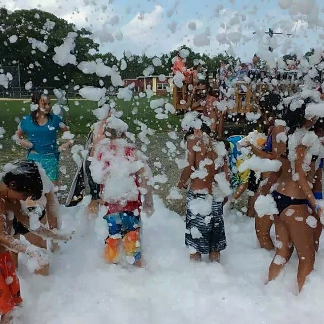Wet and wild Hayride throughout the campground with water war zones and suds.  A...