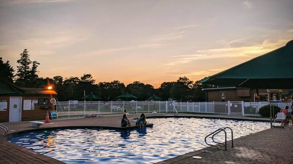 Camping laughing toasting all day deserves a night swim Stay tuned